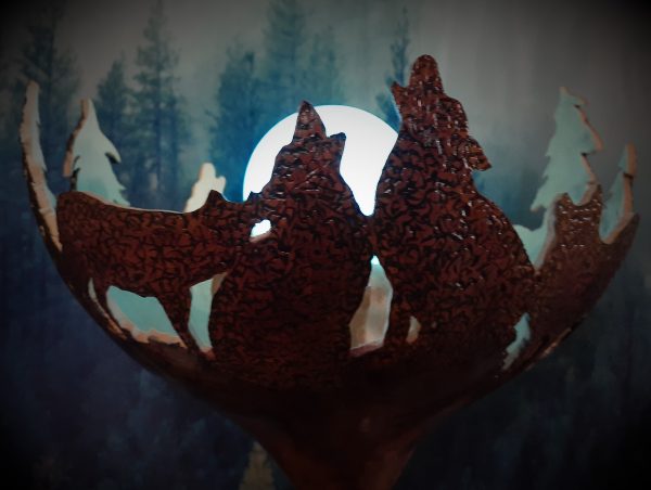A decorative gourd lamp with wolves and trees