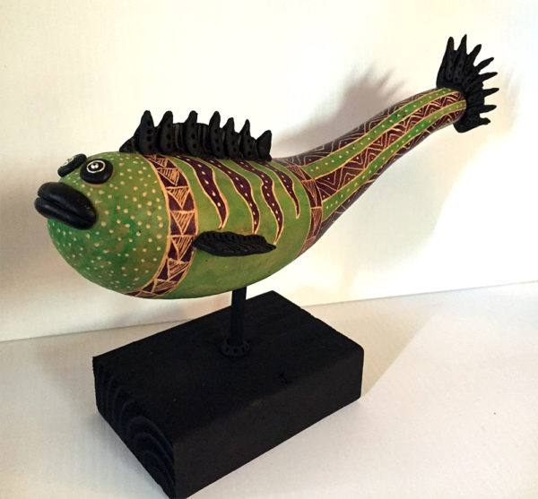 A fish made from a gourd, on a stand